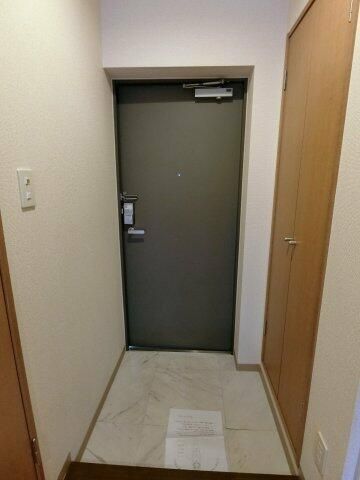 ドエル・ミョウセイ 玄関