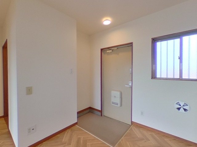 ホワイトシティ新井 玄関