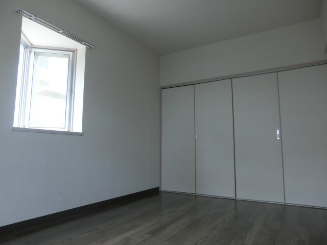 マンションたむかい ベッドルーム