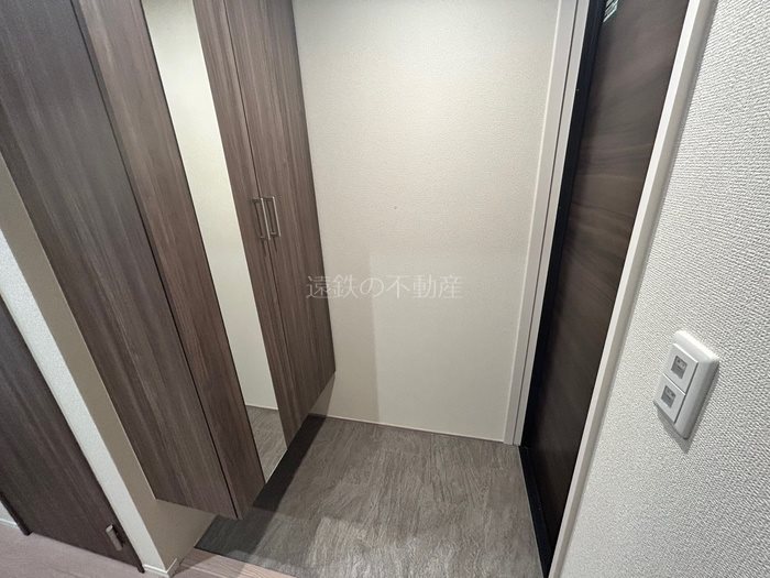 プレジール 玄関