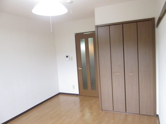 高御所ロイヤルマンション ベッドルーム