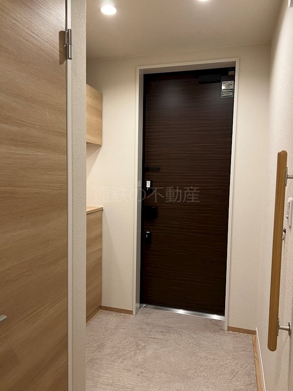 ＡＸＩＳ助信 玄関