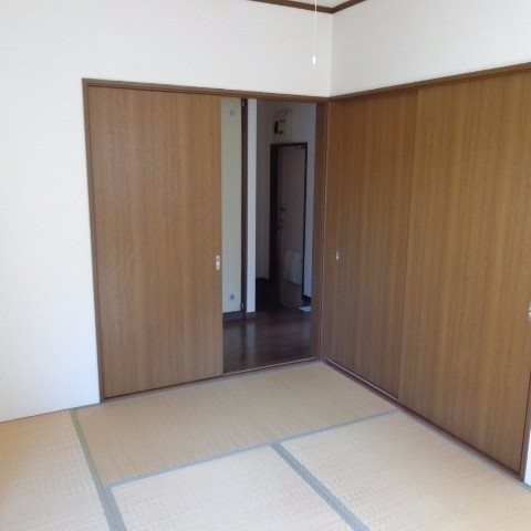ファミールF ベッドルーム