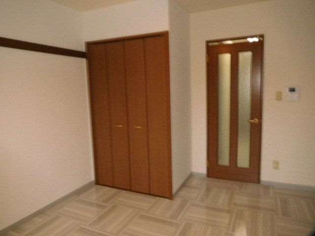 高御所ロイヤルマンション ベッドルーム