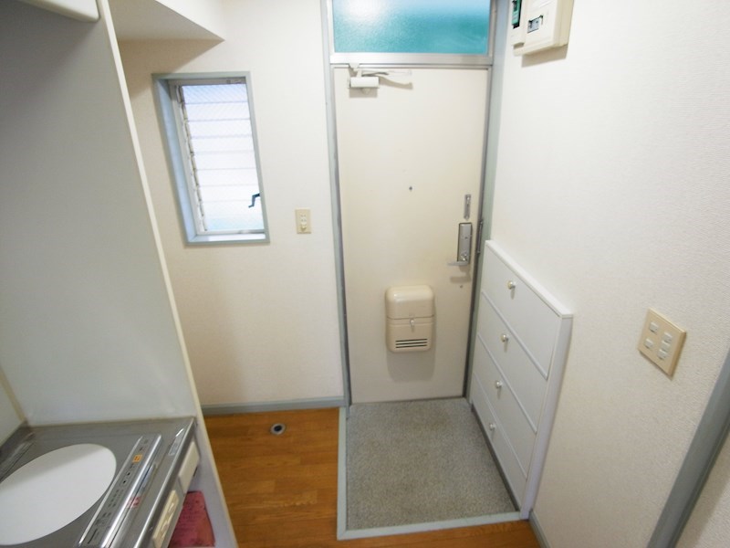 コーマス旭 玄関