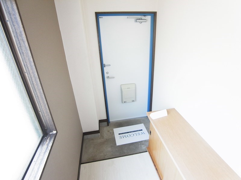 モトハシホームズ 玄関