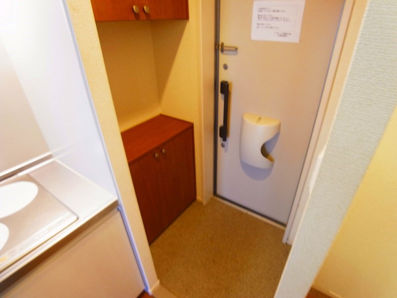 プランドール初石 玄関