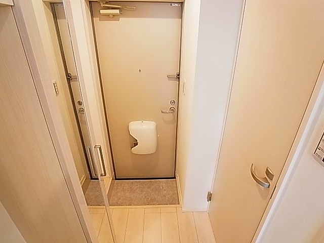 ハーモニーテラス日の出町4 玄関