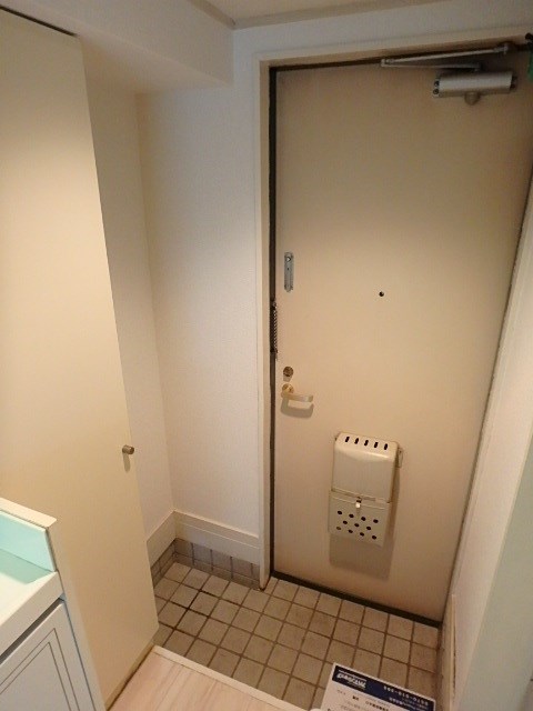 ジュネパレス塚本 玄関