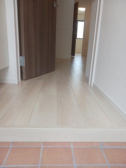 オーチャードＤ 玄関