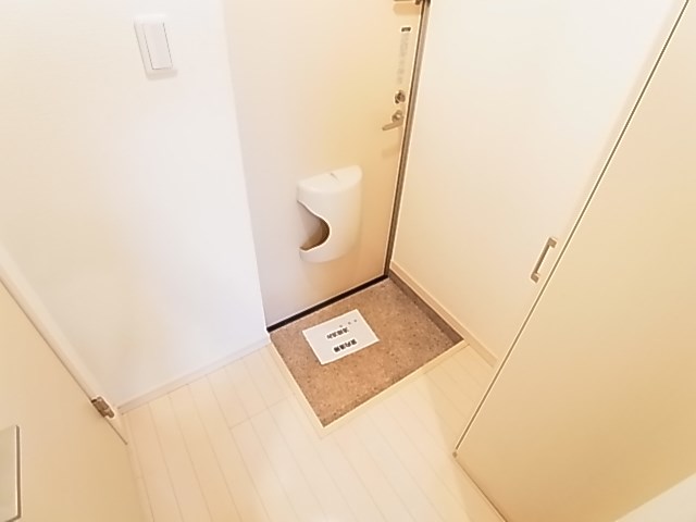 クイーンズコート２ 玄関