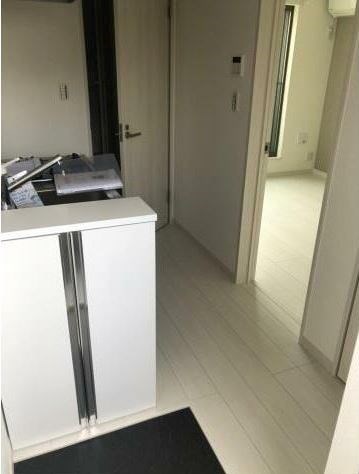 アンビシオン新田 玄関