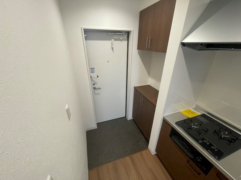 レジデンス向小金 玄関