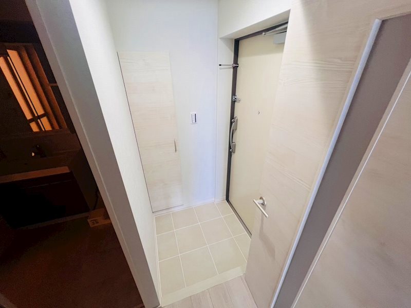 アルファコート谷在家 玄関