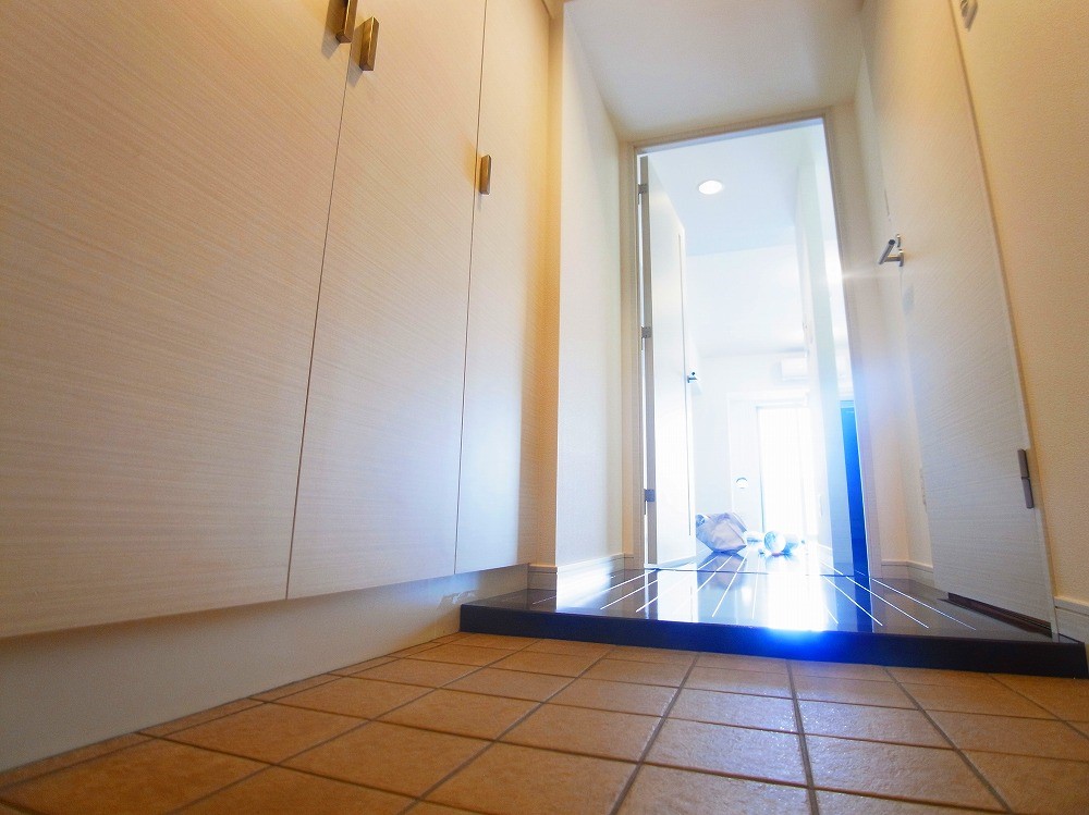 プライムアーバン亀有 玄関