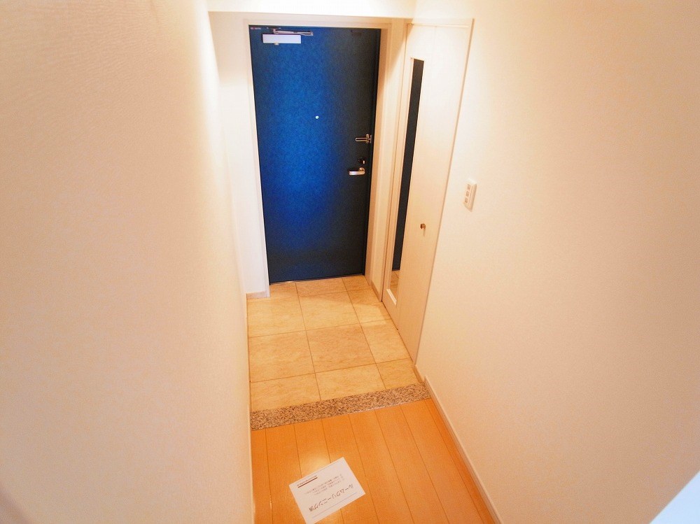 ロイヤルパークス新田 玄関