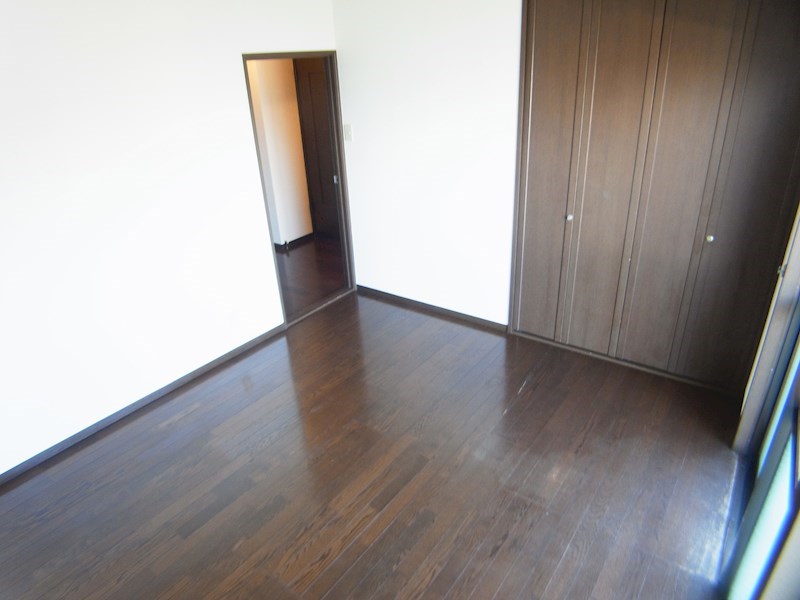 第三春実マンション ベッドルーム