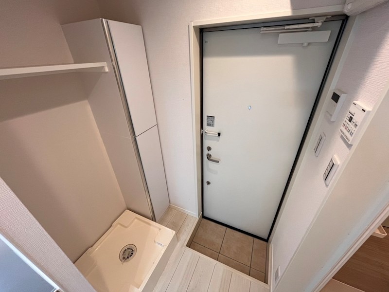 津川サンライト足立 玄関