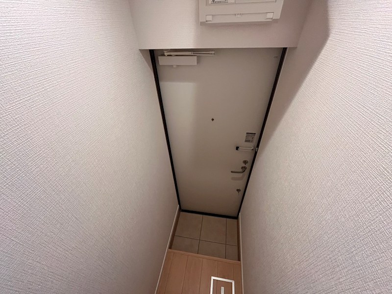 津川サンライト足立 玄関