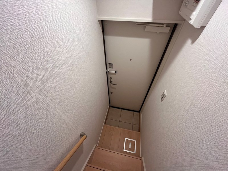 津川サンライト足立 玄関