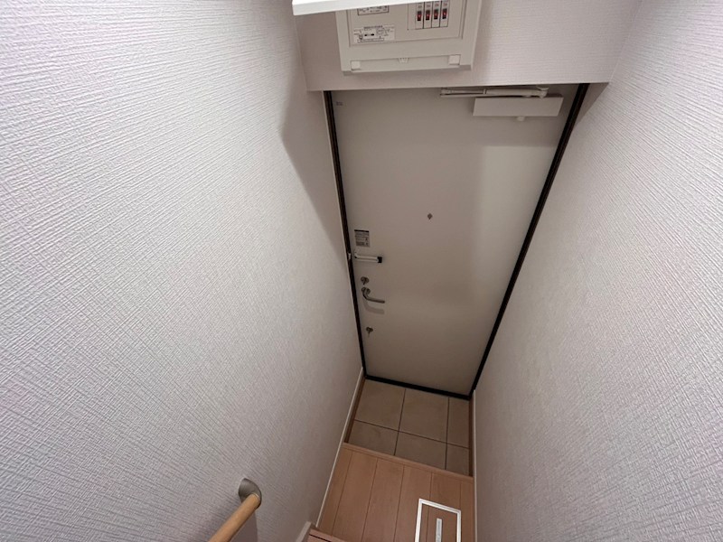 津川サンライト足立 玄関