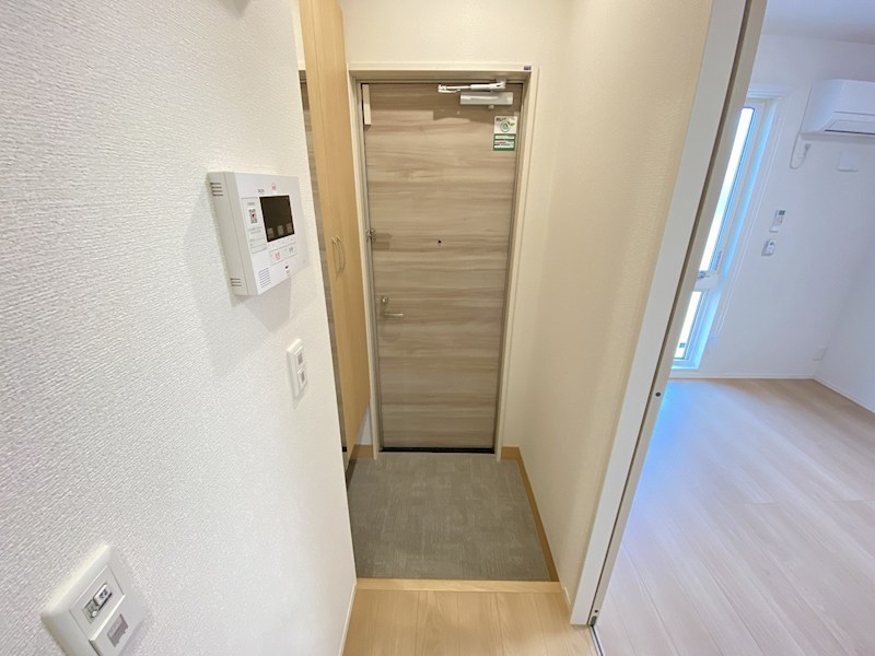 プレジール 玄関