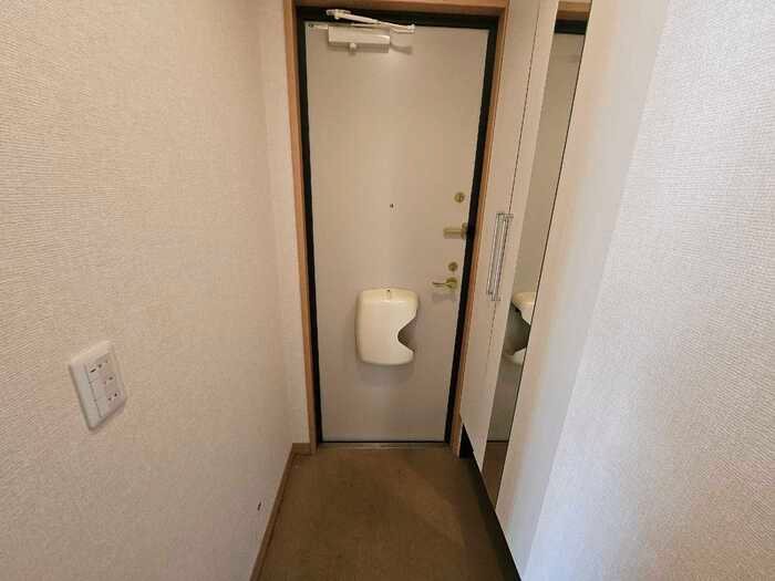 リビングタウン州見台　D棟 玄関