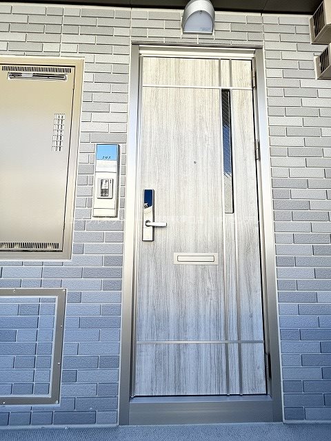 アテンションハイム三輪 玄関