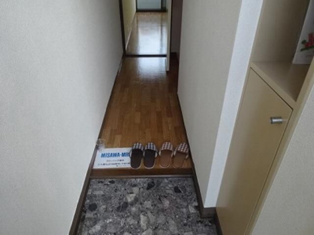 プチメゾンたま 玄関