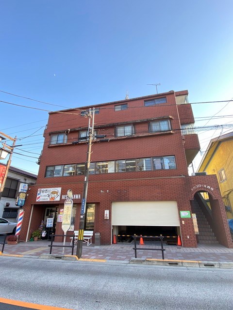 トリコロール西川 401号室 外観