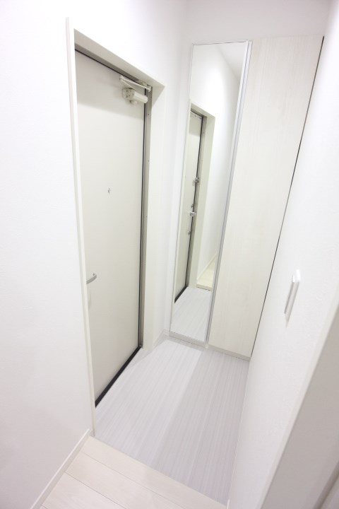 プレジール妙法寺 玄関