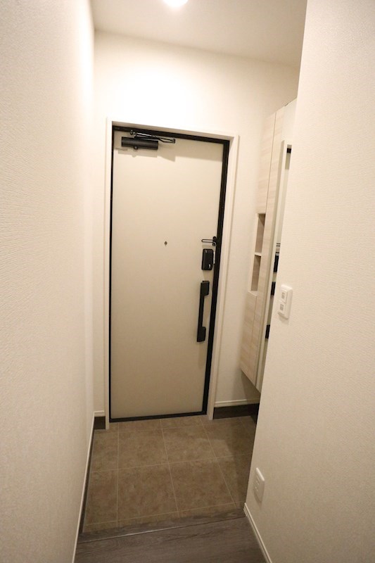 ザ・アパートメント谷上 玄関