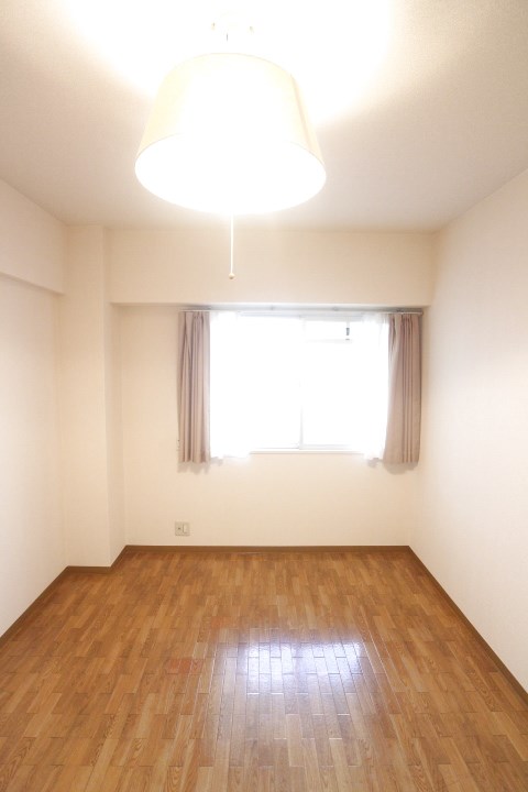 前原町マンション ベッドルーム
