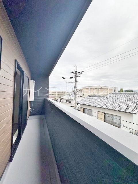 朝の春風とふんわりしっぽ ベランダ