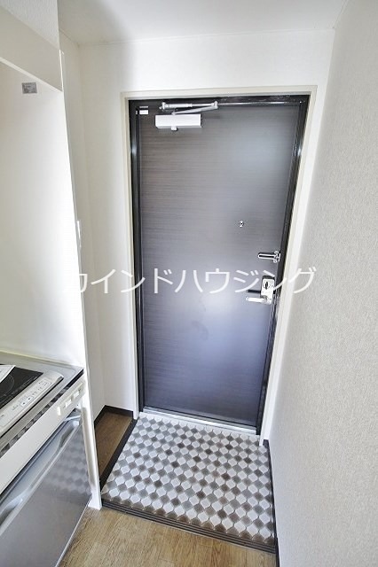 ケアンズクラブ岸里 玄関