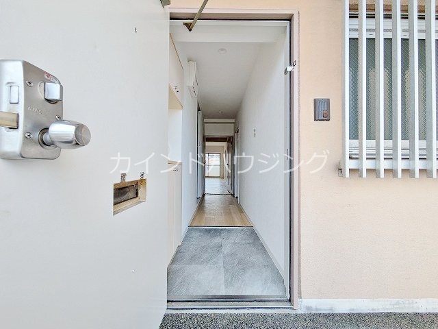ヴィラスリースター住之江 玄関