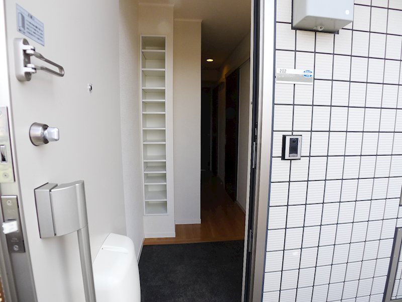 Lahaina駒木台 玄関