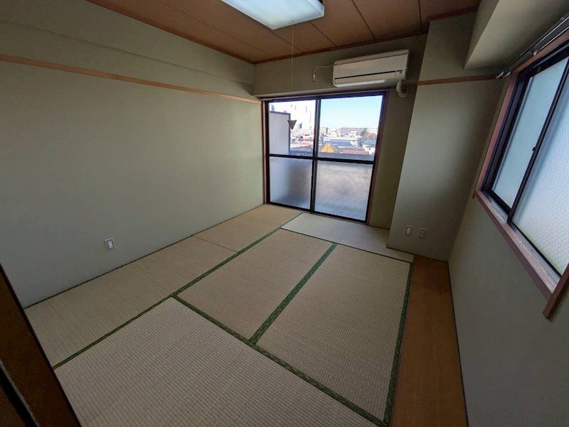 平間ロイヤルマンション ベッドルーム