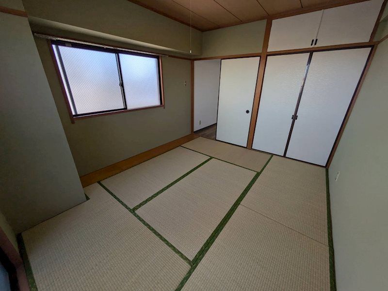 平間ロイヤルマンション ベッドルーム