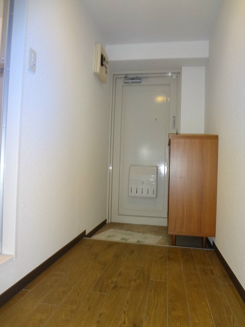 クリスタルコーポ大島 玄関