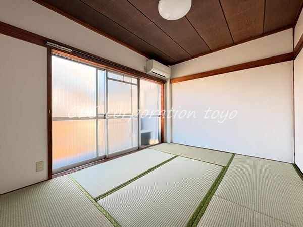 川出マンション ベッドルーム