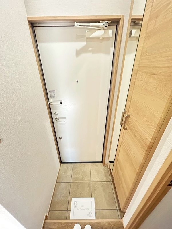 ヴィラ・リバーサイド 玄関