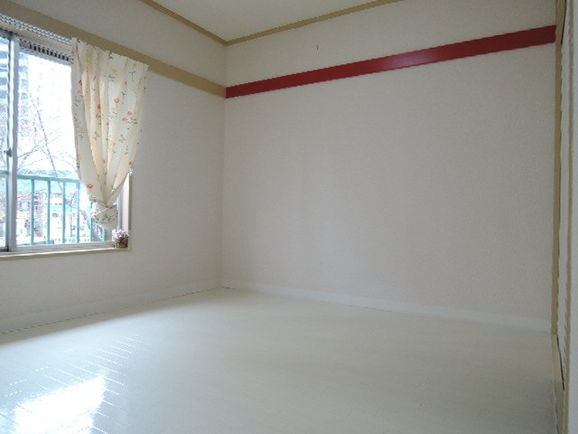 松筑コーポ ベッドルーム