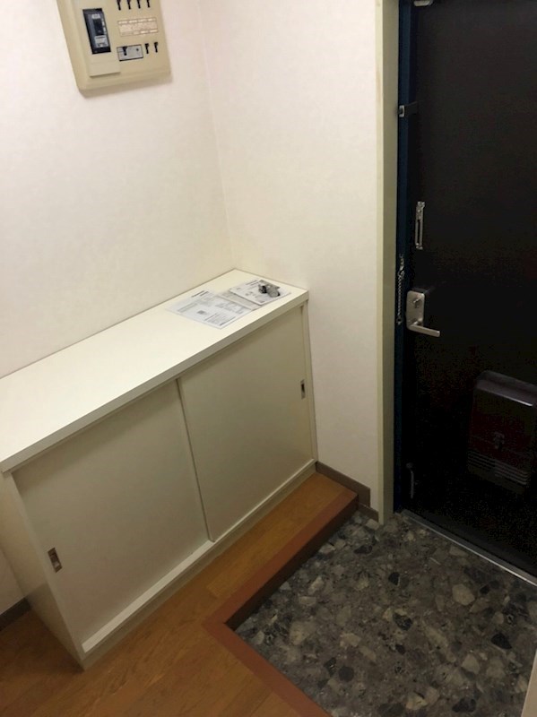 タウンコート丸義 玄関