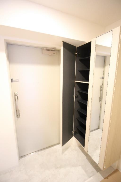 クレシェンテ月島 玄関