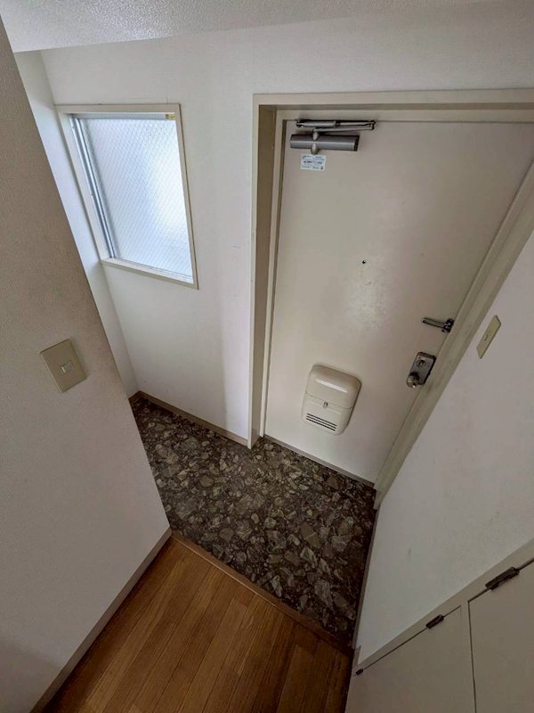 ベルゾーネ千住 玄関