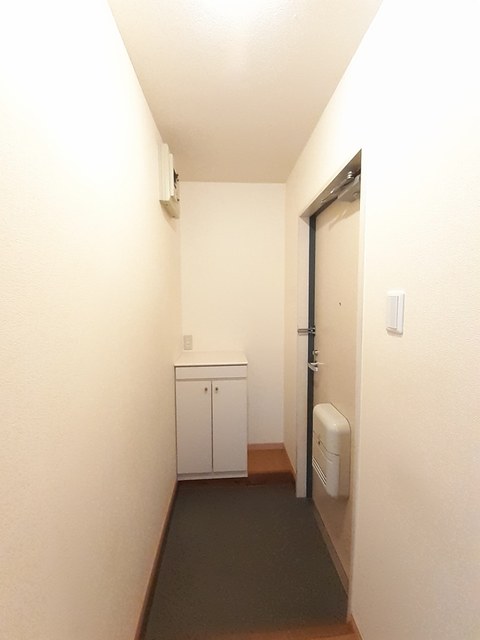 プラドール田川 玄関