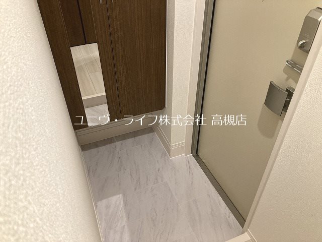 ネクストステージヤハタ 玄関