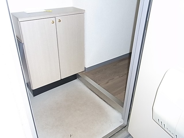 ヴィラージュ城北 玄関