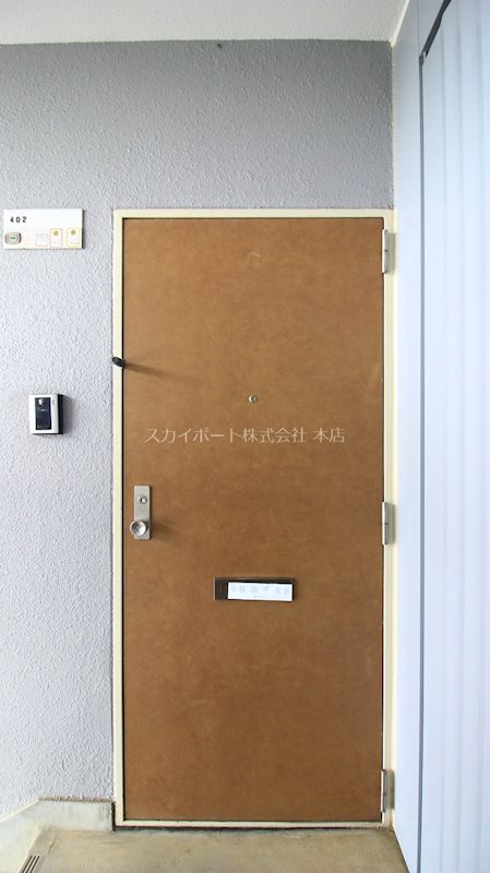 初生パークハイツ 玄関